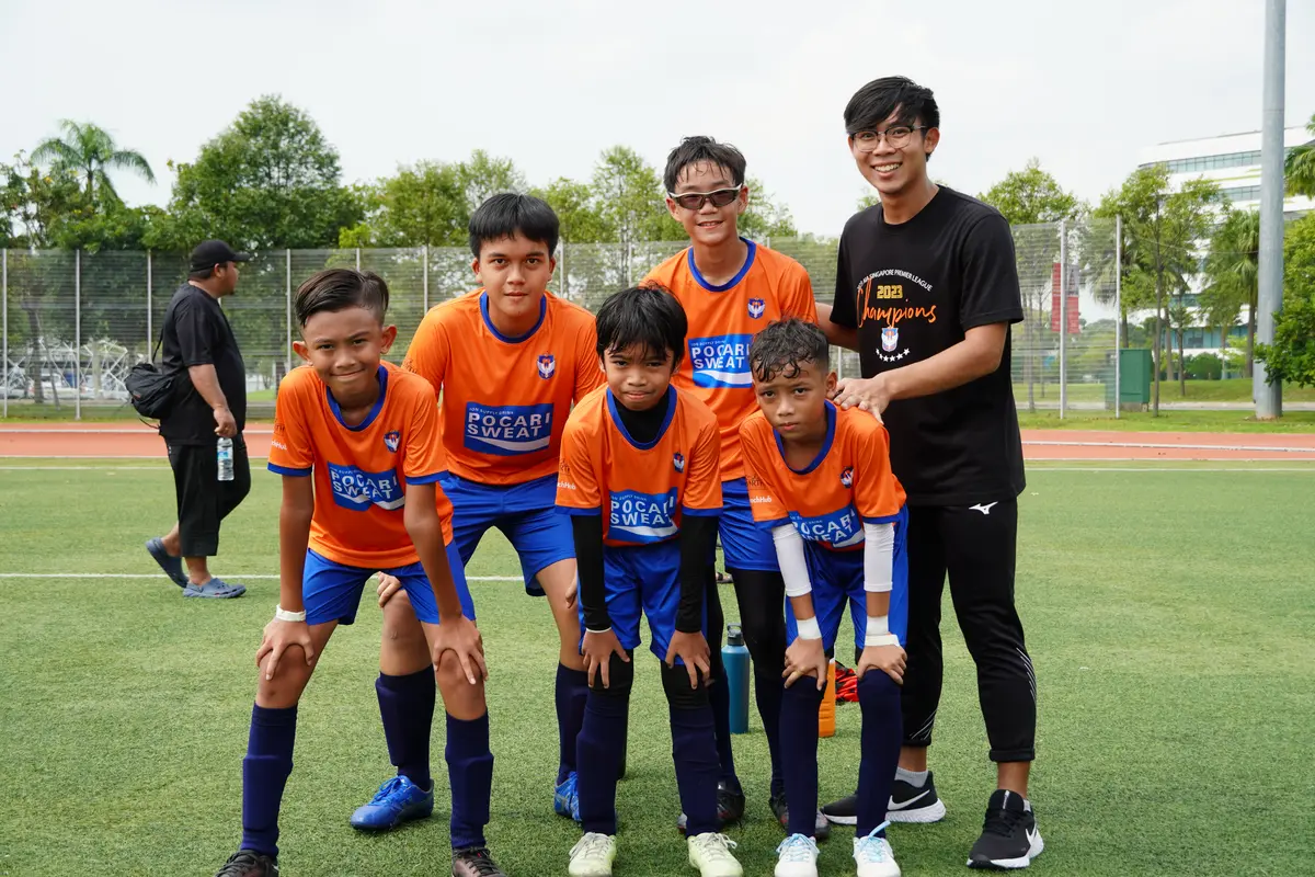 A Strikers Cup team with its coaches after the tournament