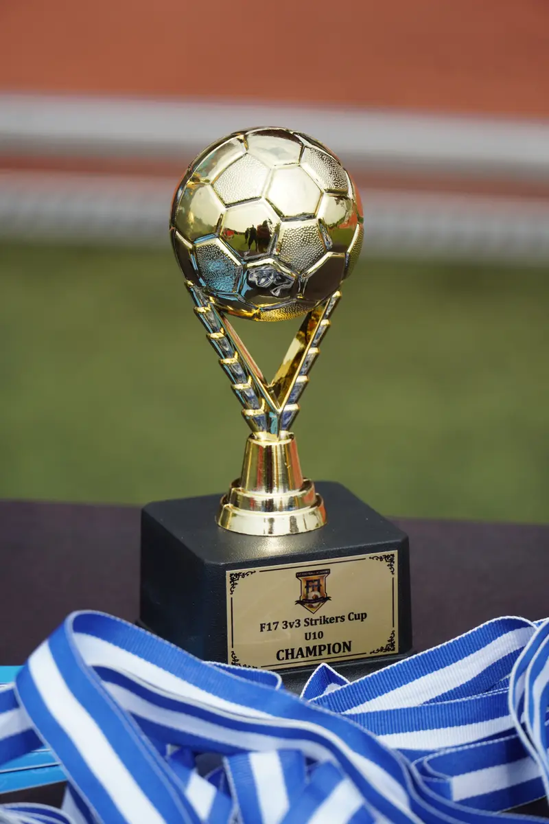 The F17 3v3 Strikers Cup trophy and winners medals